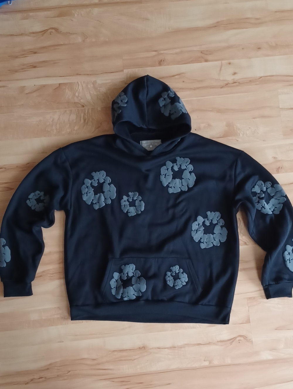 Denim Tears Men's Black Hoodie with Gray Floral Patch Accents